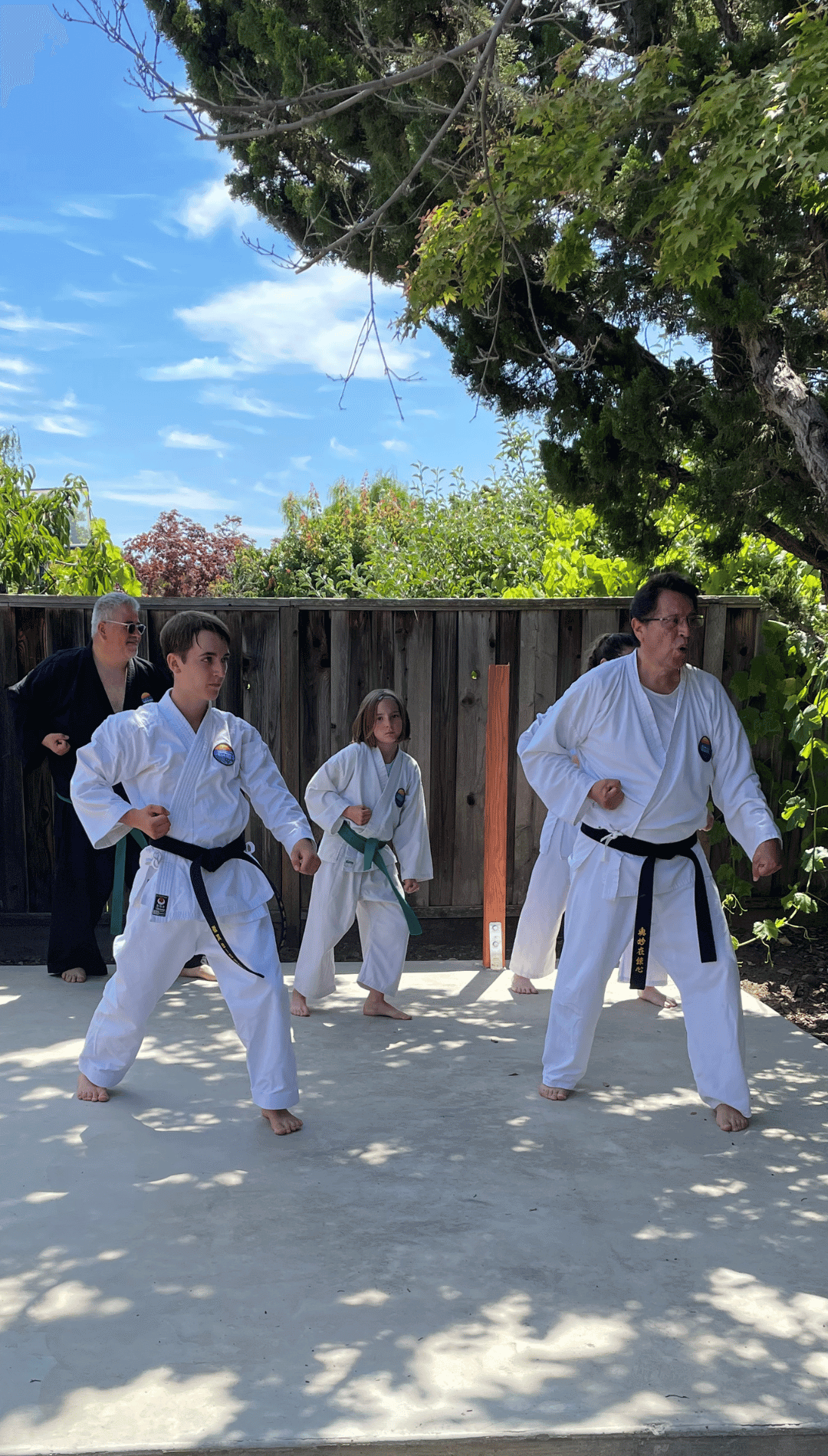 Castro Valley Mountain Karate students train outdoors.