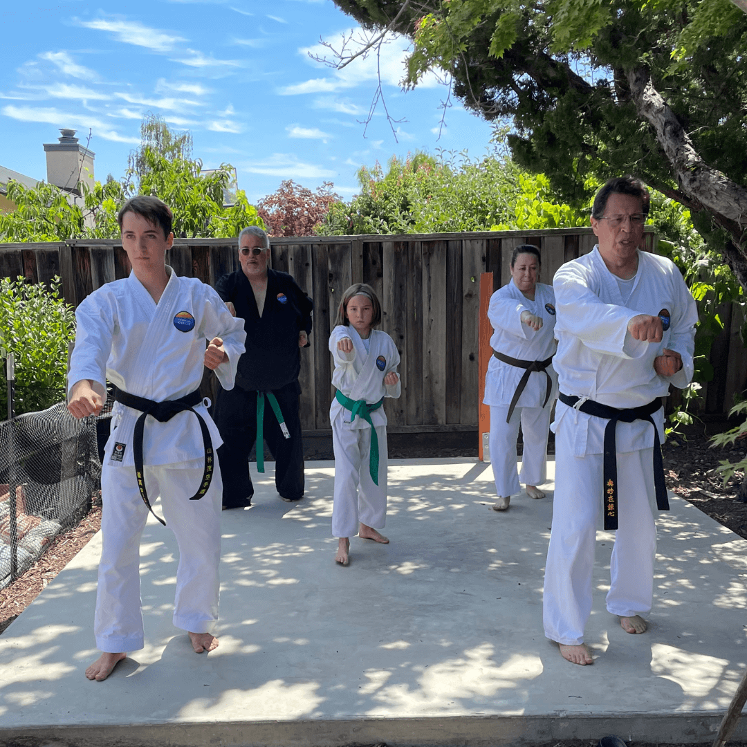 Students of Mountain Karate, Castro Valley, train outside.